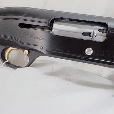 Beretta Angle port Class A-303  shot gun, 12 gauge 3in, est. $300 to $1200.