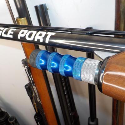 Beretta Angle port Class A-303  shot gun, 12 gauge 3in, est. $300 to $1200.