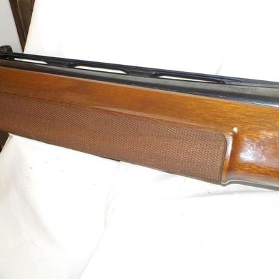 Beretta Angle port Class A-303  shot gun, 12 gauge 3in, est. $300 to $1200.