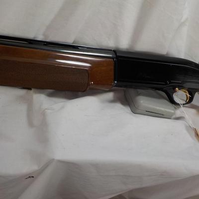 Beretta Angle port Class A-303  shot gun, 12 gauge 3in, est. $300 to $1200.