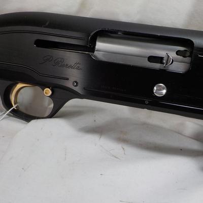 Beretta Angle port Class A-303  shot gun, 12 gauge 3in, est. $300 to $1200.