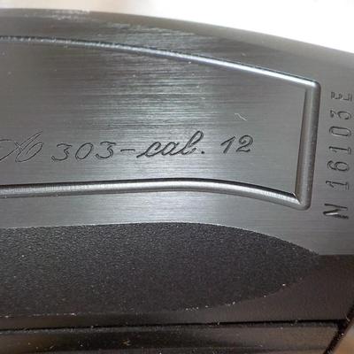 Beretta Angle port Class A-303  shot gun, 12 gauge 3in, est. $300 to $1200.