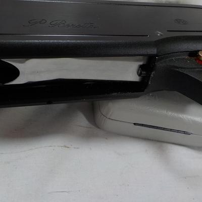 Beretta Angle port Class A-303  shot gun, 12 gauge 3in, est. $300 to $1200.