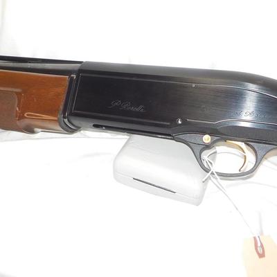 Beretta Angle port Class A-303  shot gun, 12 gauge 3in, est. $300 to $1200.