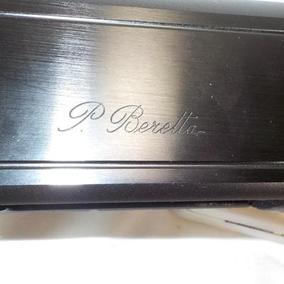 Beretta Angle port Class A-303  shot gun, 12 gauge 3in, est. $300 to $1200.