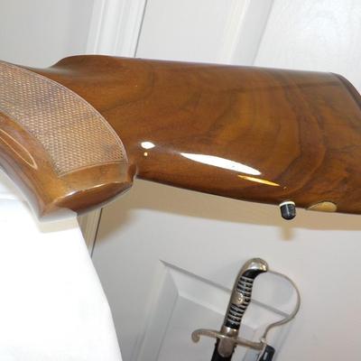 Beretta Angle port Class A-303  shot gun, 12 gauge 3in, est. $300 to $1200.