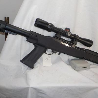 Ruger  model 10/22- 22 LR semi auto w/ scope 10 shot mag. est. $200 to $450.