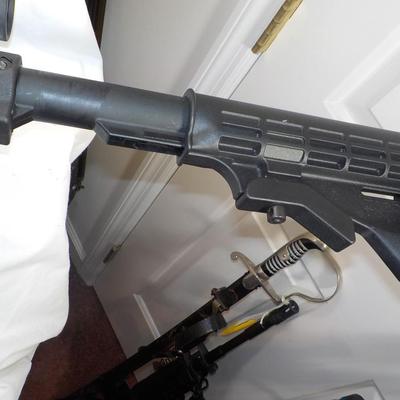 Ruger  model 10/22- 22 LR semi auto w/ scope 10 shot mag. est. $200 to $450.