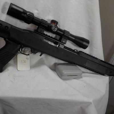 Ruger  model 10/22- 22 LR semi auto w/ scope 10 shot mag. est. $200 to $450.
