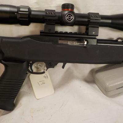 Ruger  model 10/22- 22 LR semi auto w/ scope 10 shot mag. est. $200 to $450.