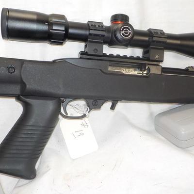 Ruger  model 10/22- 22 LR semi auto w/ scope 10 shot mag. est. $200 to $450.