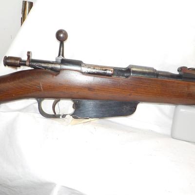 Mauser Model Fat 41, 6.6 x 52 mm Carcana rifle. est $200 to $600.