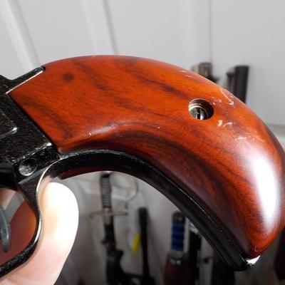 Rough Rider Heritage 22 cal . single action w/ manuel ejector. est. $125 to $200.
