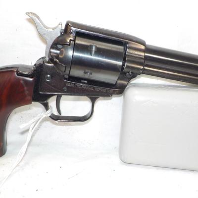 Rough Rider Heritage 22 cal . single action w/ manuel ejector. est. $125 to $200.
