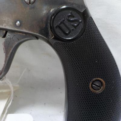 U.S. Revolver double action 22 cal. self protection . est $120 to $200.
