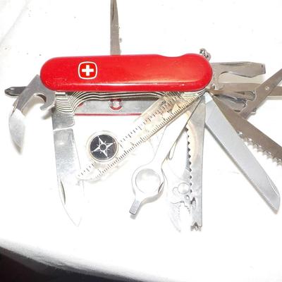 Swiss Army super 16 blades for survivle .pocket knife   est. $ 20 to $100.