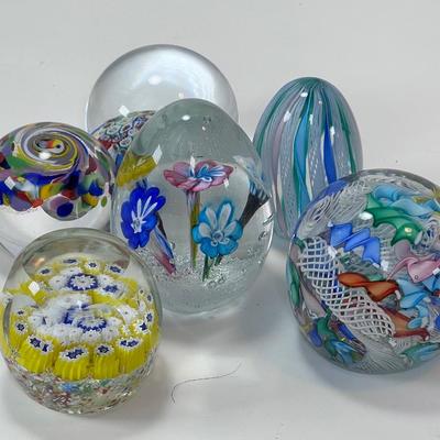 Six Murano glass Paperweights