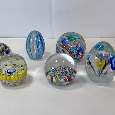 Six Murano glass Paperweights