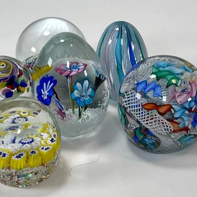 Six Murano glass Paperweights