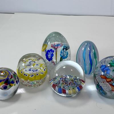 Six Murano glass Paperweights