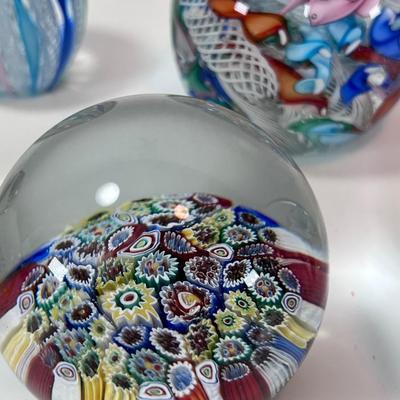 Six Murano glass Paperweights