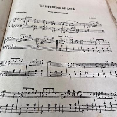 Antiques wonderful music folio with metal spine
