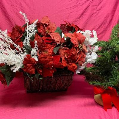 Basket of flowers and a small Christmas tree