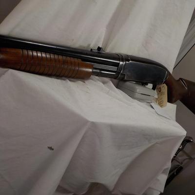 Winchester Model 12 Ga. Pump w/ 32 in. Barrel shot gun. est. $300 to $500.