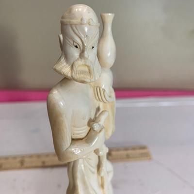 Carved Asian Figure about 6.5 inches tall