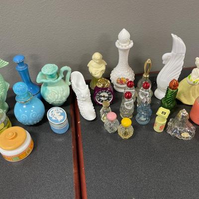 Large collection of Avon bottles
