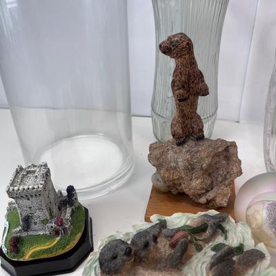 Music boxes, sea otter figurines, vases
