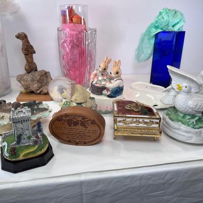 Music boxes, sea otter figurines, vases