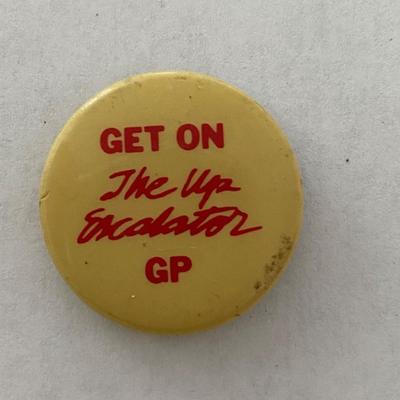 Get on the Up Escalator GP vintage pin