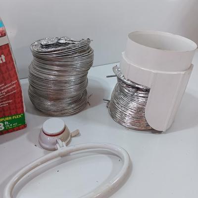 Dryer vent pipes and a flashlight