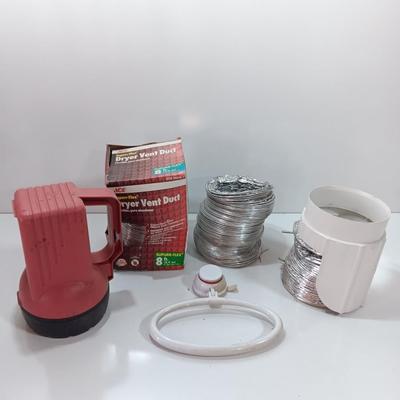 Dryer vent pipes and a flashlight