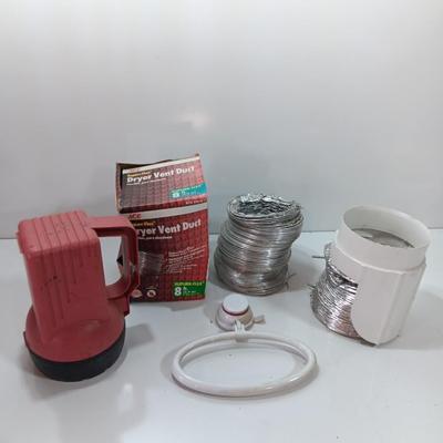 Dryer vent pipes and a flashlight
