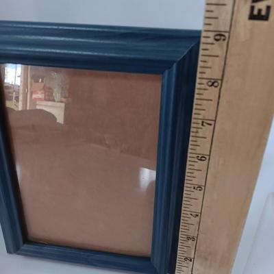 Wooden slat wall sign " Hello Beautiful" with a blue picture frame for the Beautiful's picture