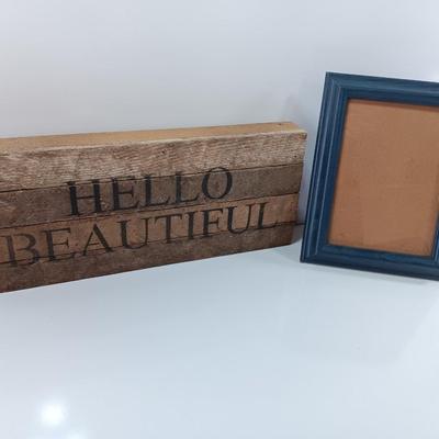 Wooden slat wall sign " Hello Beautiful" with a blue picture frame for the Beautiful's picture