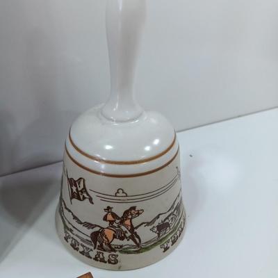 Picture frames and a ceramic Texas bell
