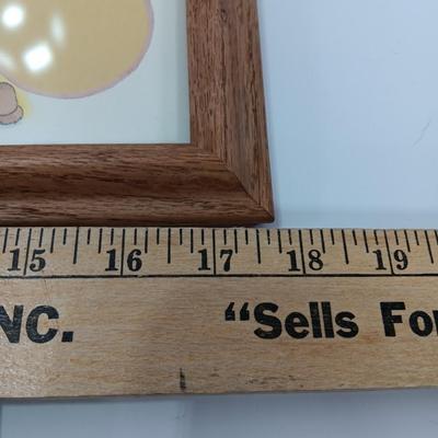 Picture frames and a ceramic Texas bell