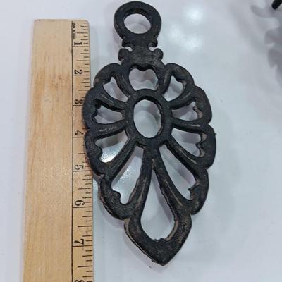 Two cast Oron trivets - Candle holder and Iron trivet