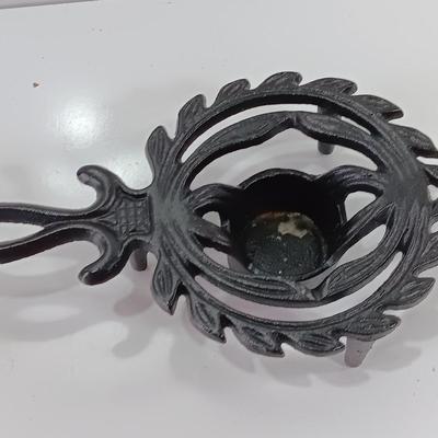 Two cast Oron trivets - Candle holder and Iron trivet