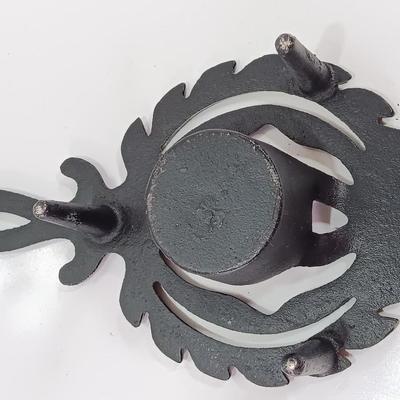 Two cast Oron trivets - Candle holder and Iron trivet