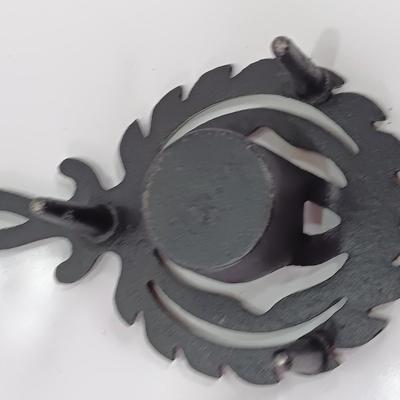 Two cast Oron trivets - Candle holder and Iron trivet