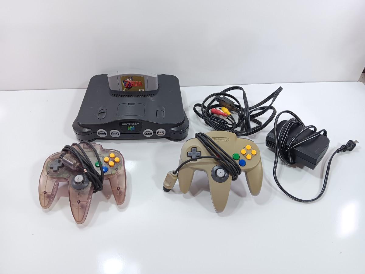 Nintendo 64 With Controllers, Zelda Game, And Cords 