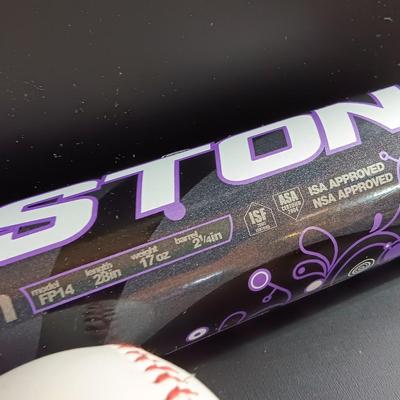 Easton softball bat with baseball