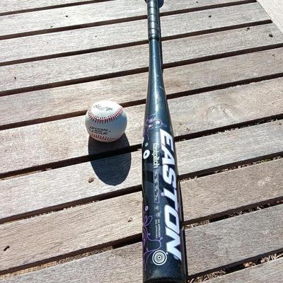 Easton softball bat with baseball