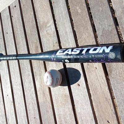 Easton softball bat with baseball