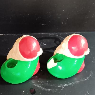 Two antique Chalkware Santa candle holders