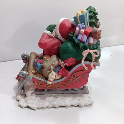 Santa figure with Sleigh full of toys